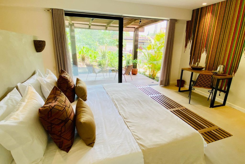 View of luxury suite with garden view at the Patio Del Mundo hotel in Medellin