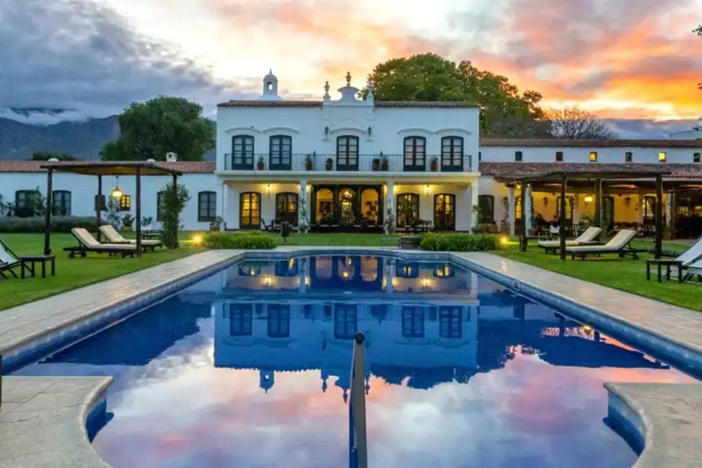 Sunset over the outdoor pool at the Patios de Cafayate hotel in Argentina