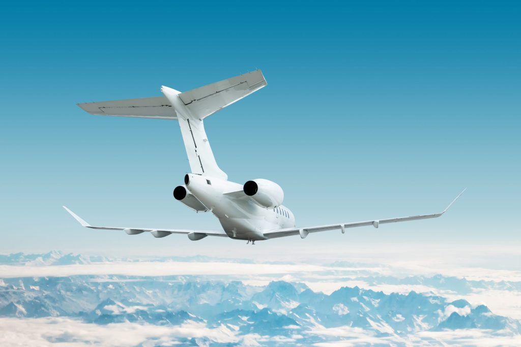 View of small private jet flying from Chile to Argentina during luxury tour