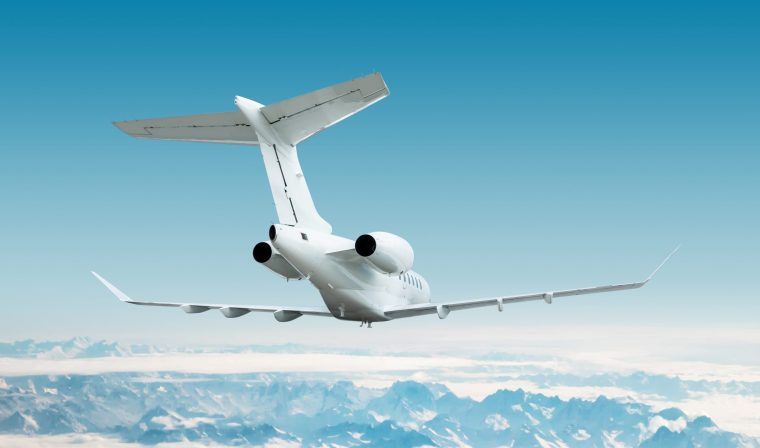 View of small private jet flying from Chile to Argentina during luxury tour