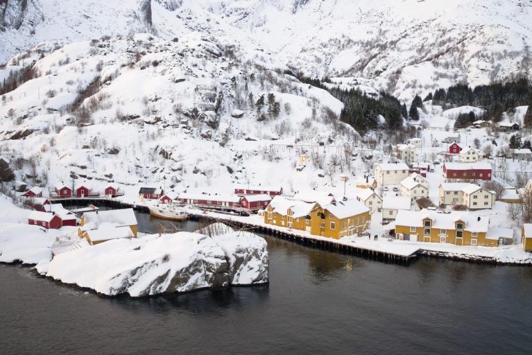 An aerial view of Nusfjord Village in winter
