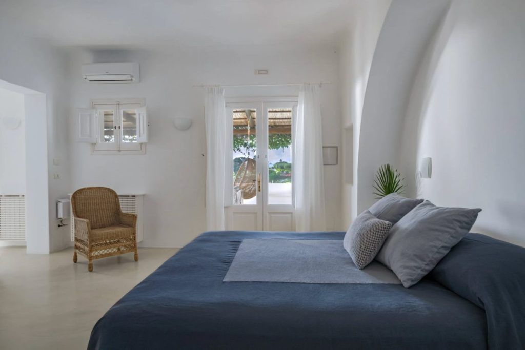 A deluxe sea view room at Capofaro Resort.