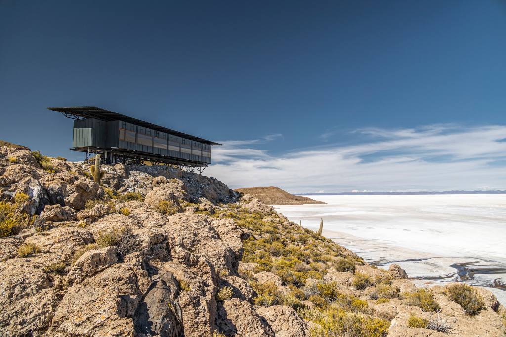 Exterior view of Explora Uyuni Lodge next to salt flats in Bolivia