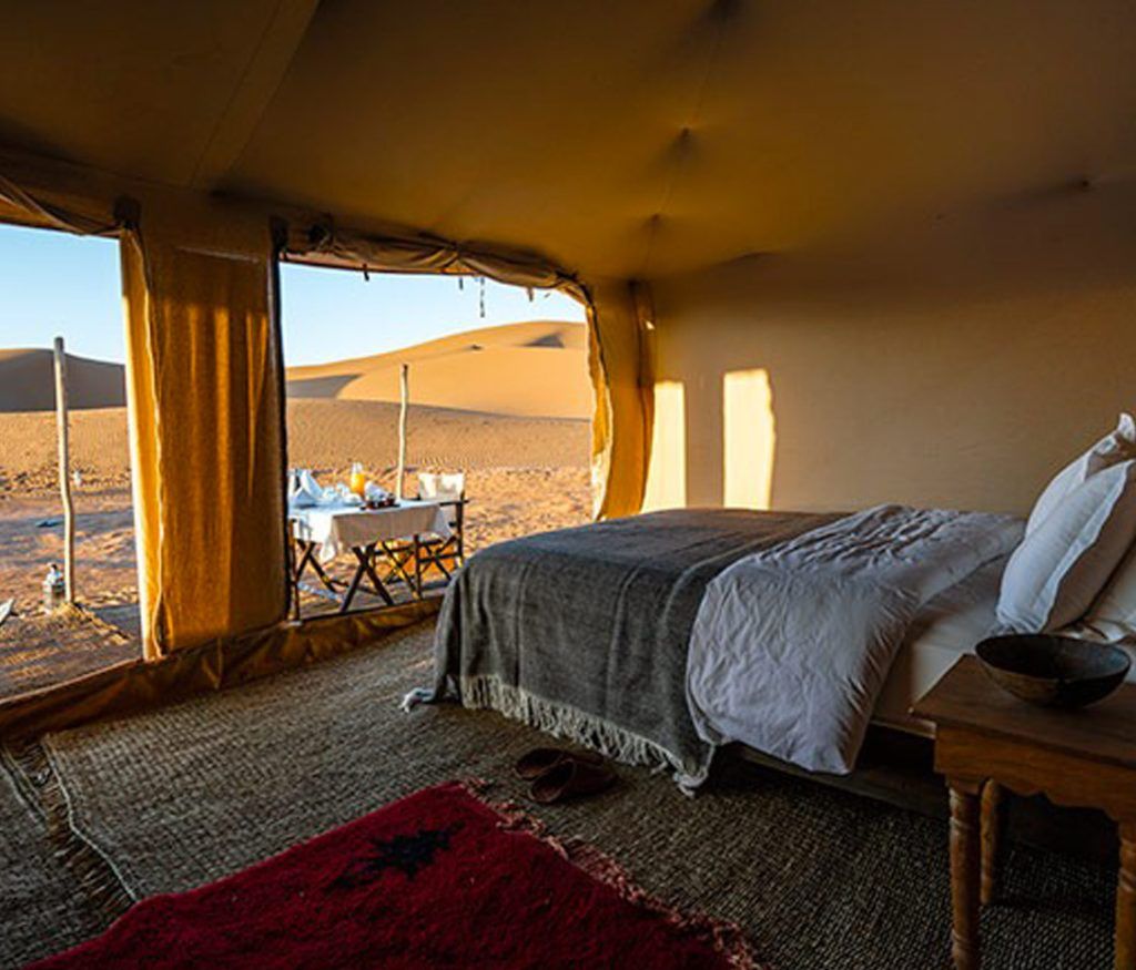An interior view of one of the tents in the Luxury Desert Camp in Morocco.