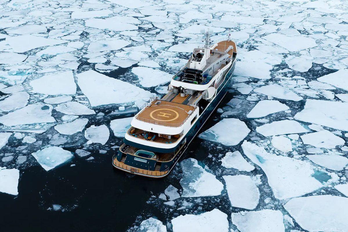 An aerial view of the Aqua Lares sailing through ice.