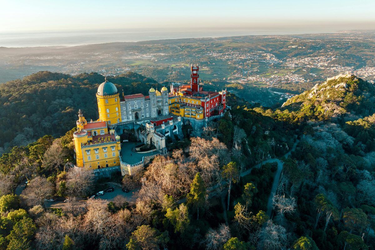 An aerial view of Pena Palace situated in Sintra on the mountaintop.