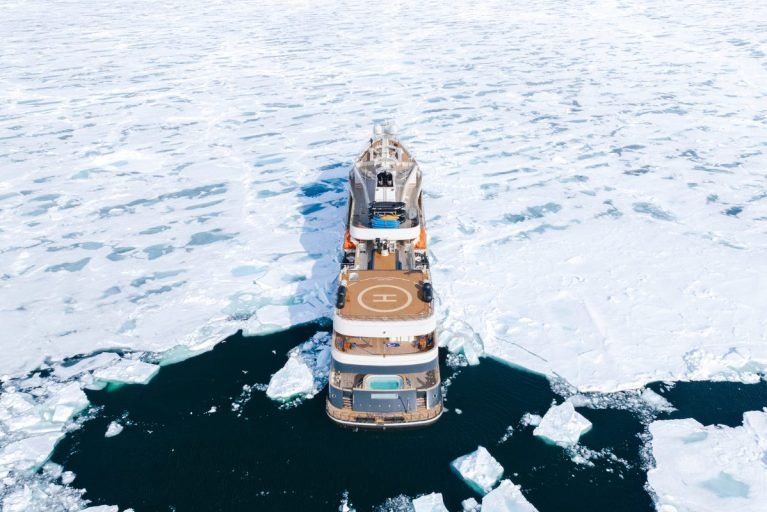The Aqua Lares cruising through ice in the Arctic Circle.